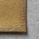 Antares Teppich Farbe gelb mit Leinenband ocker